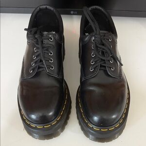 Dr. Martens Black Leather Flats with Yellow Stitching